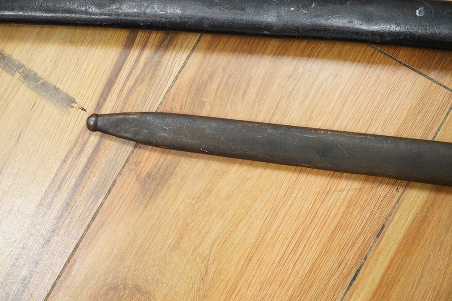 A First World War Turkish army officer’s sword, with pipe back blade, regulation iron guard pierced with crescent and moon, chequered horn grips, in its iron scabbard, together with an unidentified bayonet in its scabbar